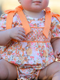 Load image into Gallery viewer, Peach Bow Smocked Floral Baby Bubble