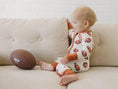 Load image into Gallery viewer, Football Print Bamboo Zippy Romper