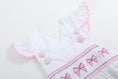 Load image into Gallery viewer, White and Pink Bows Smocked Ruffle Romper