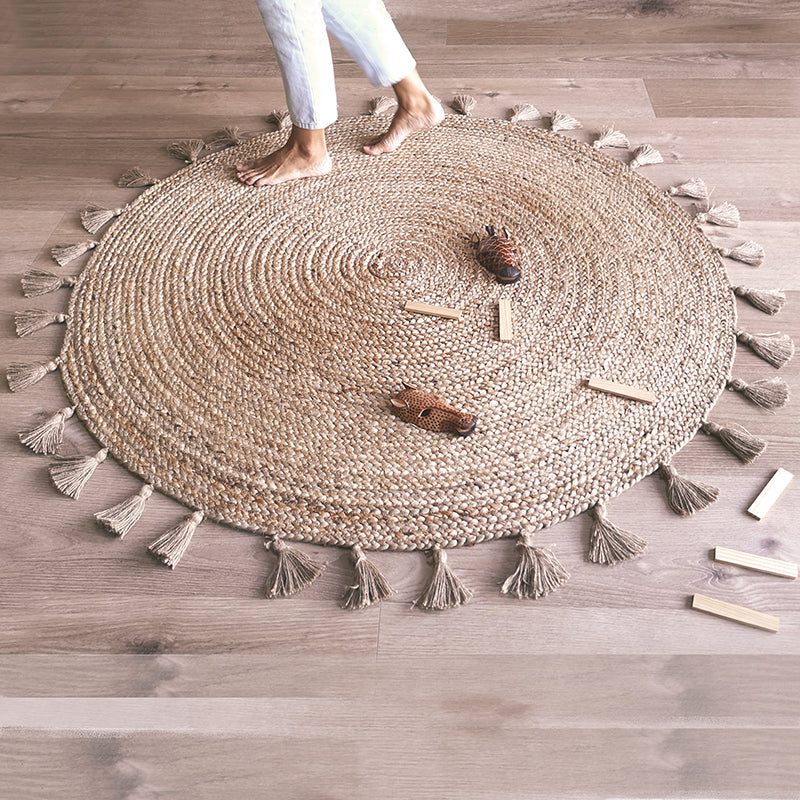 ELSE jute rug with pompoms