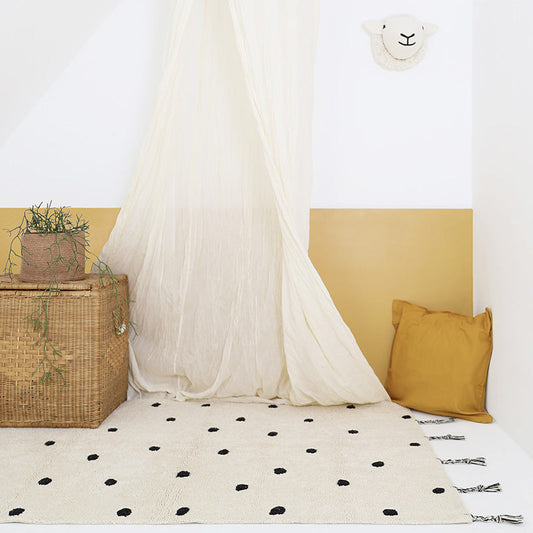 NÜMI Black children's rug with dots