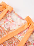 Load image into Gallery viewer, Peach Bow Smocked Floral Baby Bubble
