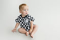 Load image into Gallery viewer, Short Sleeve Bubble Romper | Checkered Smiley Black
