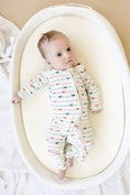 Load image into Gallery viewer, Tied with a Bow Christmas Bamboo Zippy Pajamas
