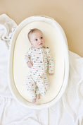 Load image into Gallery viewer, Tied with a Bow Christmas Bamboo Zippy Pajamas
