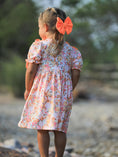 Load image into Gallery viewer, Peach Bow Smocked Floral Girl Dress
