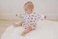 Load image into Gallery viewer, Football Print Bamboo Bubble Romper
