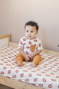 Load image into Gallery viewer, Football Print Bamboo Crib Sheet
