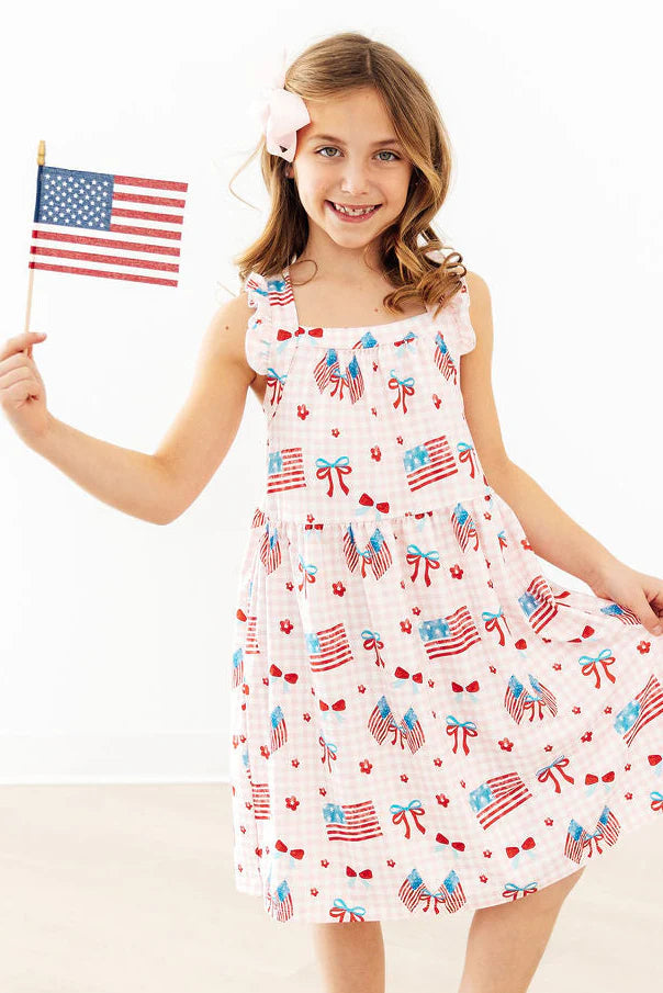 FANCY FLAGS RUFFLE CROSS BACK DRESS