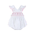 Load image into Gallery viewer, White and Pink Bows Smocked Ruffle Romper
